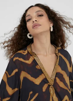 Caftan corto estampado cebra