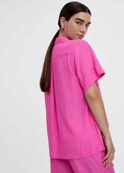 Camisa fluida con bolsillos