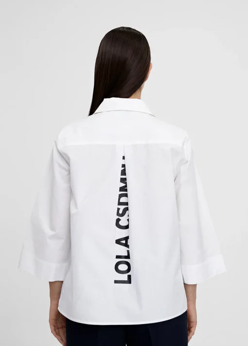 Camisa pico manga acampanada