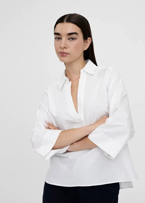 Camisa pico manga acampanada