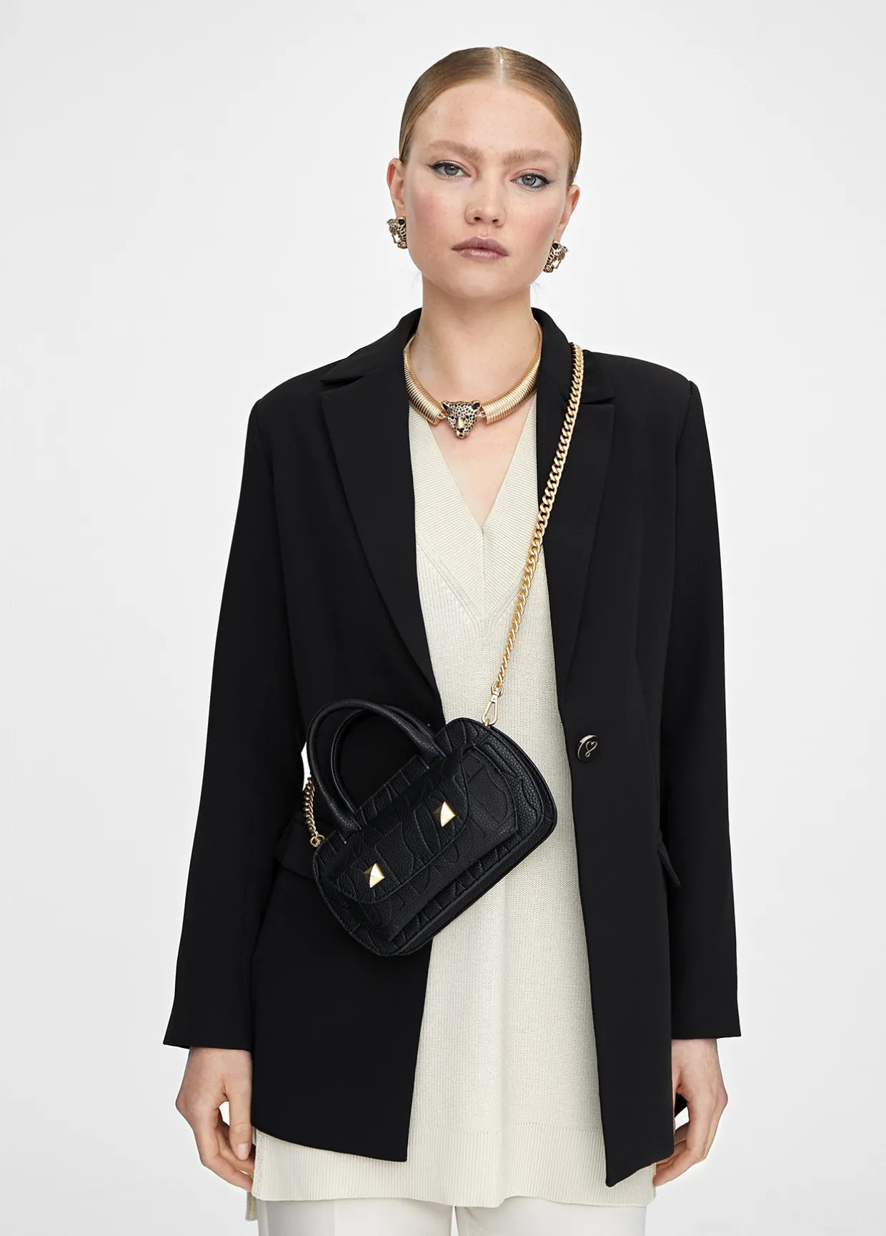 Mini bandolera con logo grabado