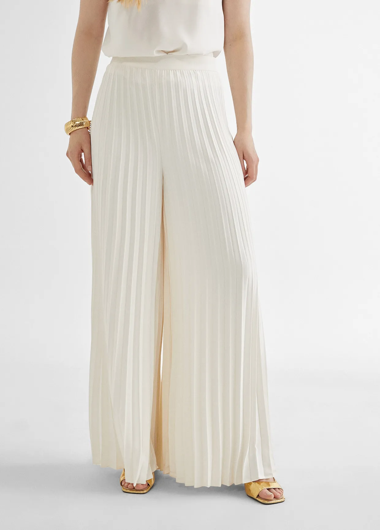 Pantalón plisado y fluído