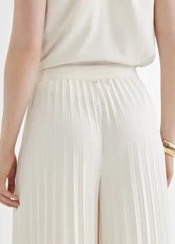 Pantalón plisado y fluído