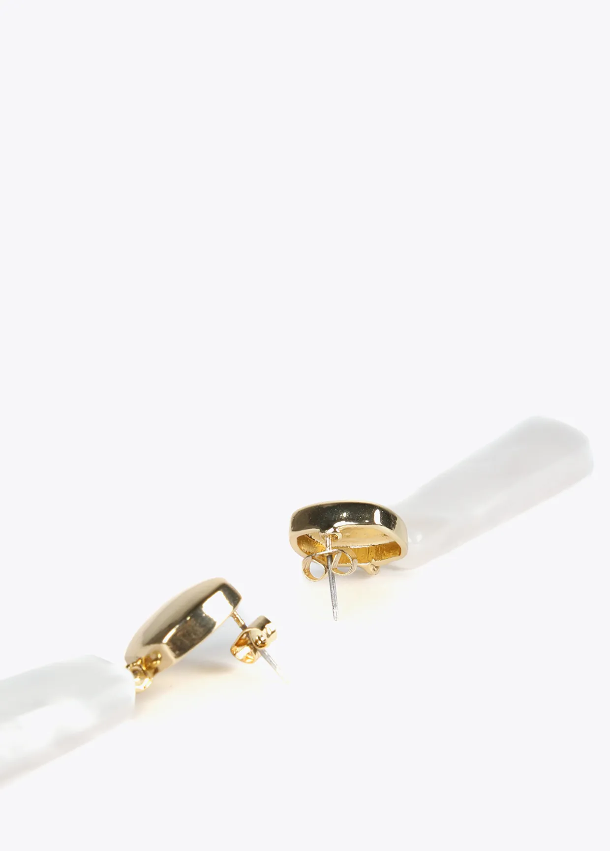 Pendientes blancos dos piezas