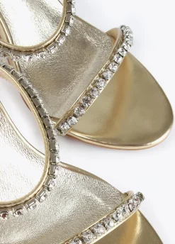 Sandalia de tacón y tiras