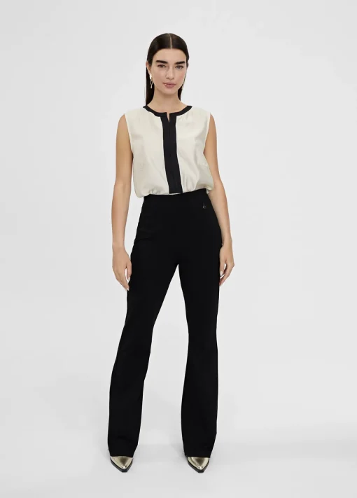 Top bicolor con aberturas