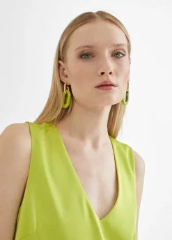 Top largo con aberturas