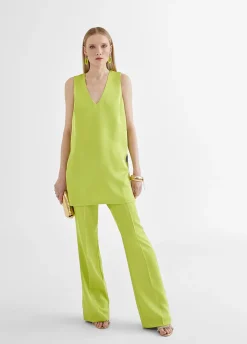 Top largo con aberturas